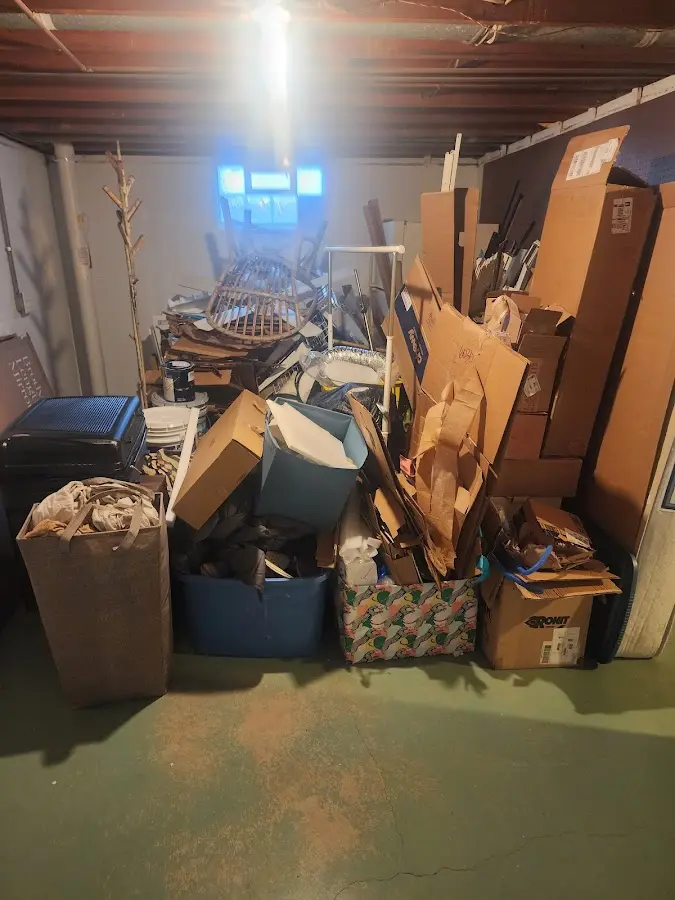 Roll-off dumpster container at job site for Construction Dumpster Rental in Harlem